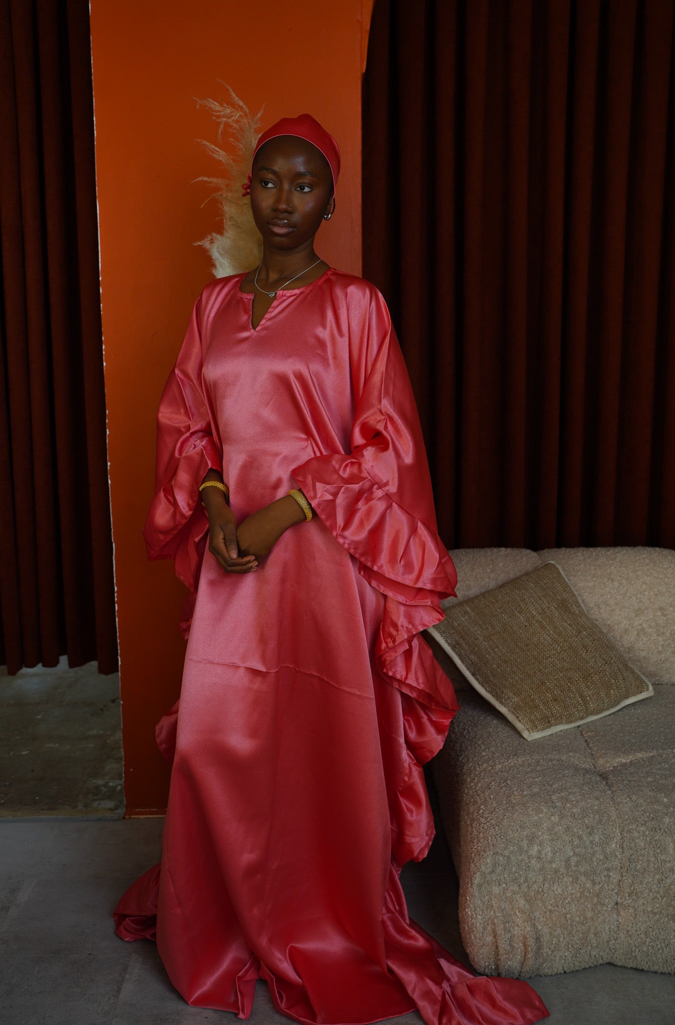 Hawa’s pink satin dress