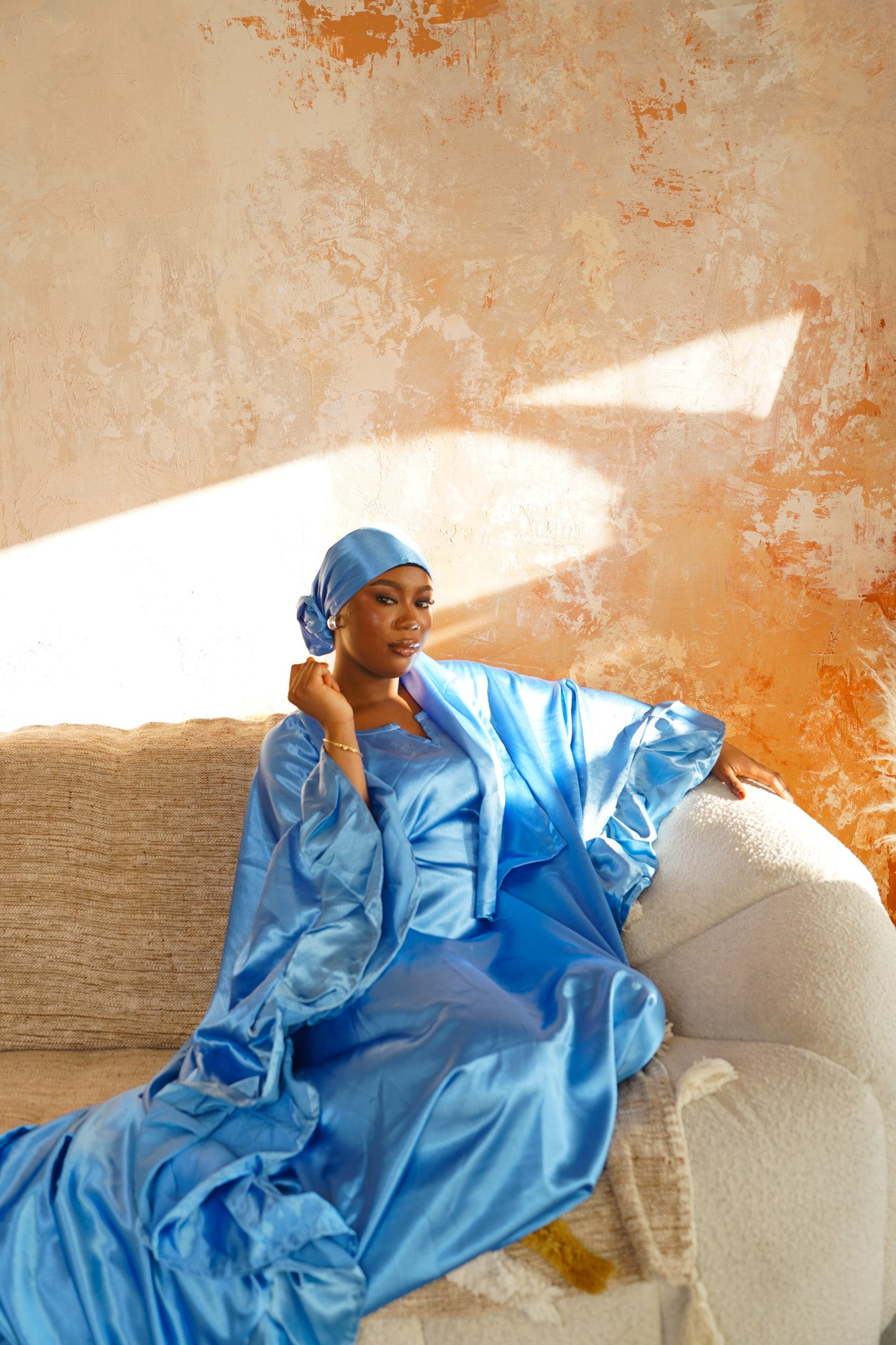 Hawa’s sky blue satin dress